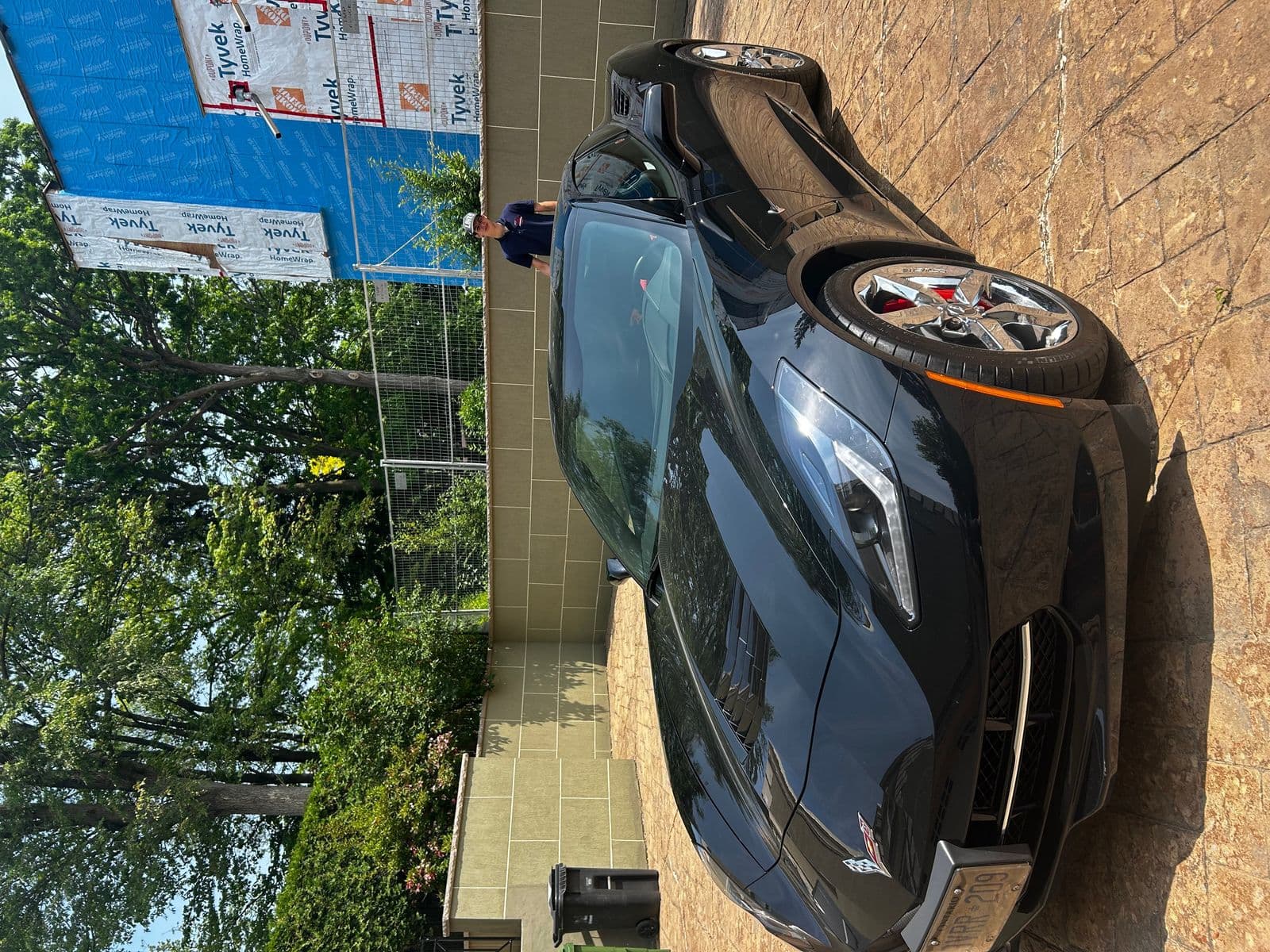 Black Corvette with showroom-ready finish after full detail