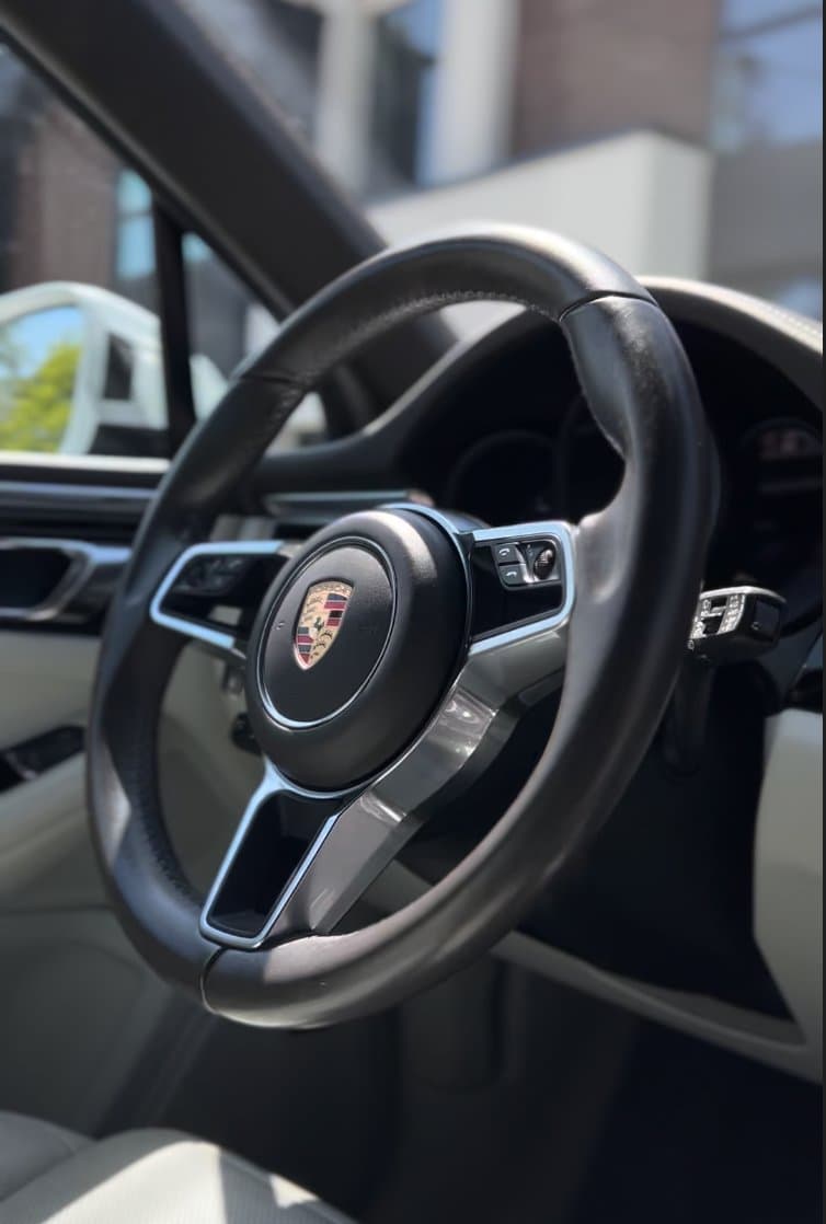 Porsche steering wheel and interior after detail